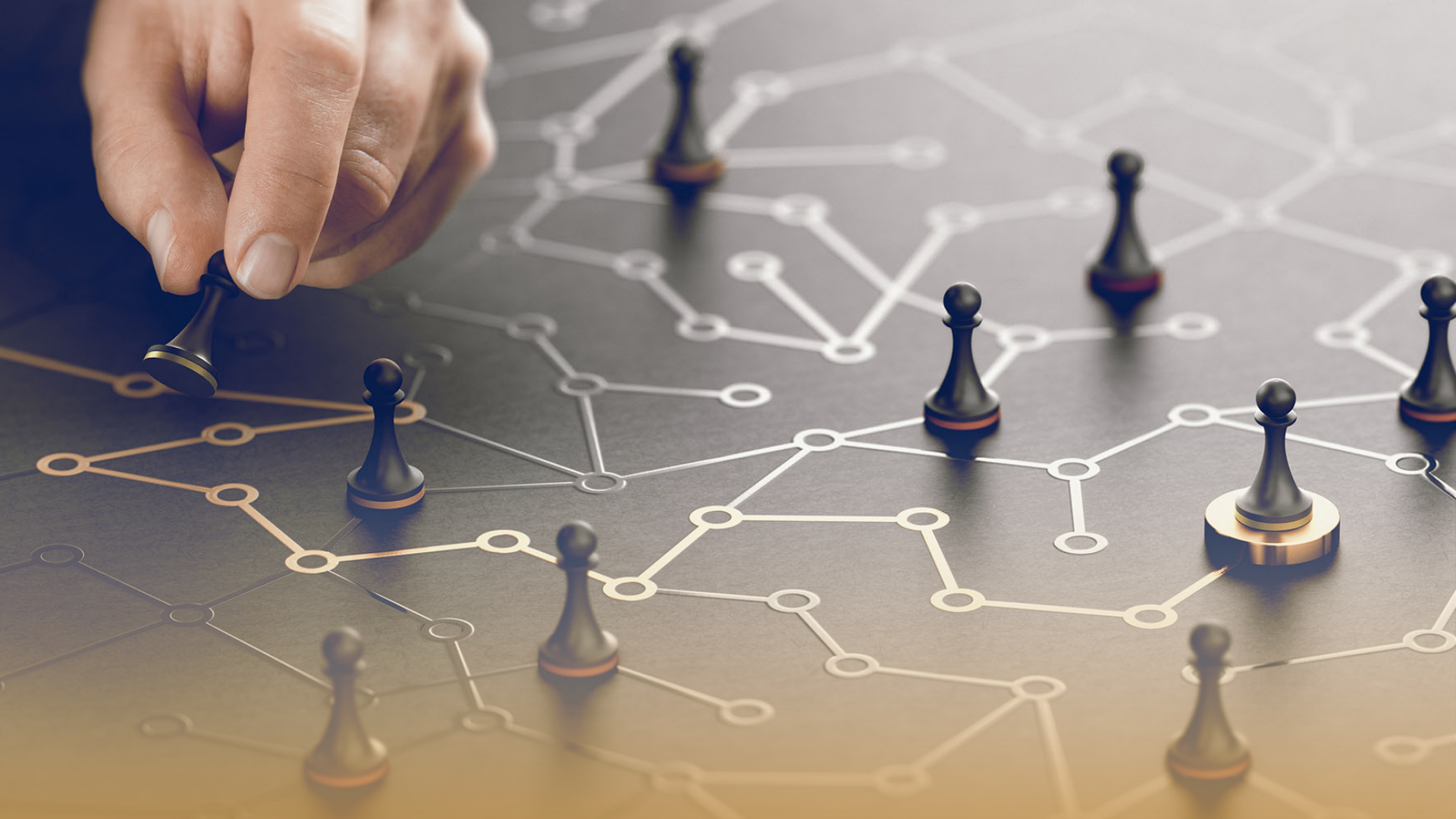 Hand placing a chess piece on a board of connected nodes